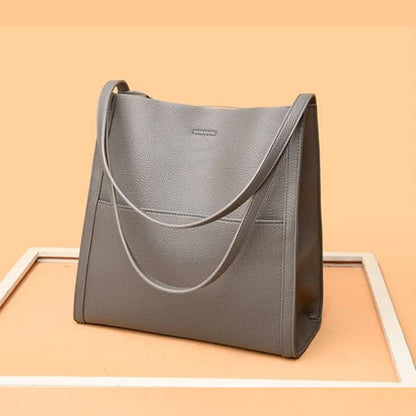 🔥👜👜【45% REDUCERE】 Geantă nouă de umăr din piele moale, simplă, elegantă și spațioasă de toamnă și iarnă